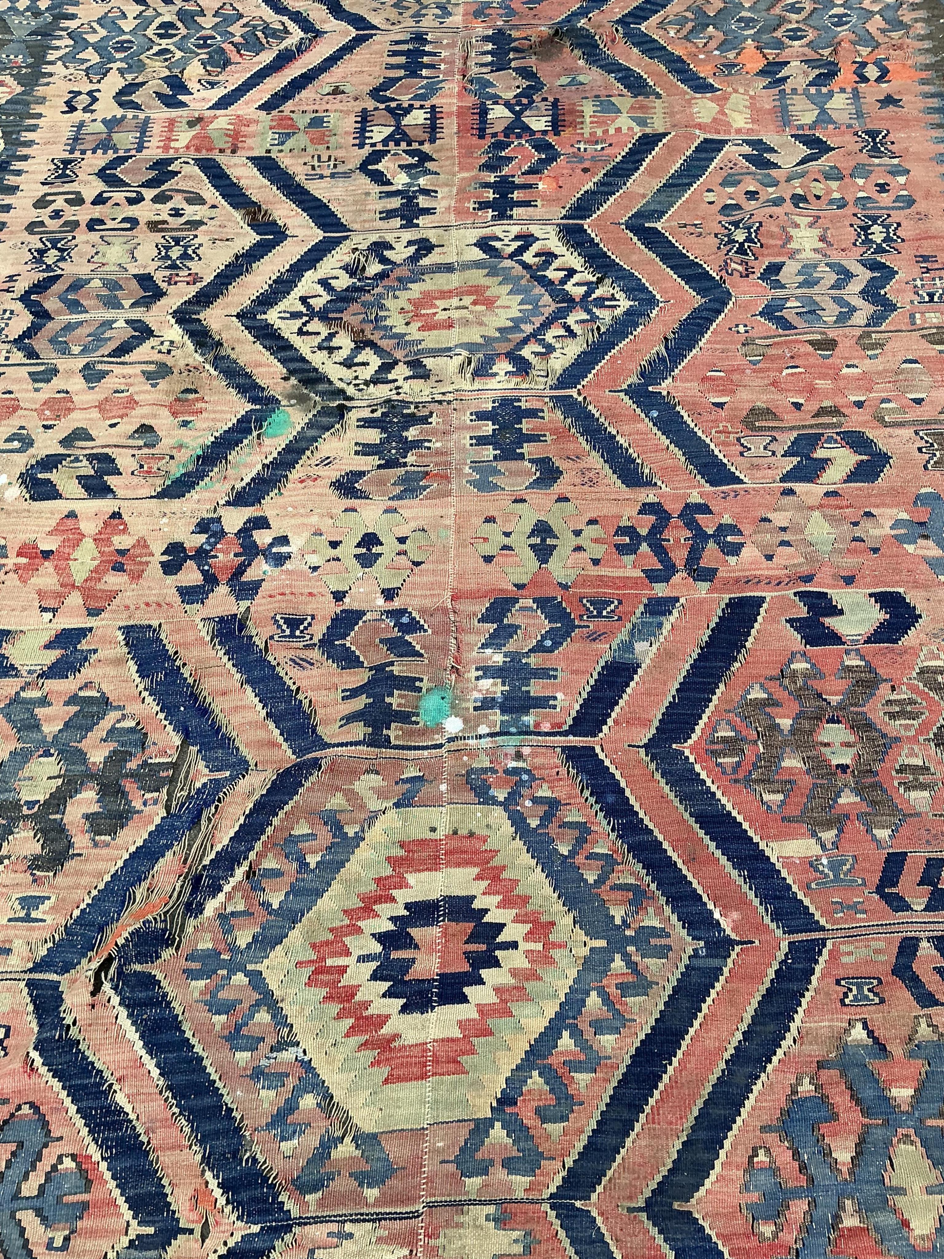 A Kilim polychrome flatweave carpet, 298 x 199cm